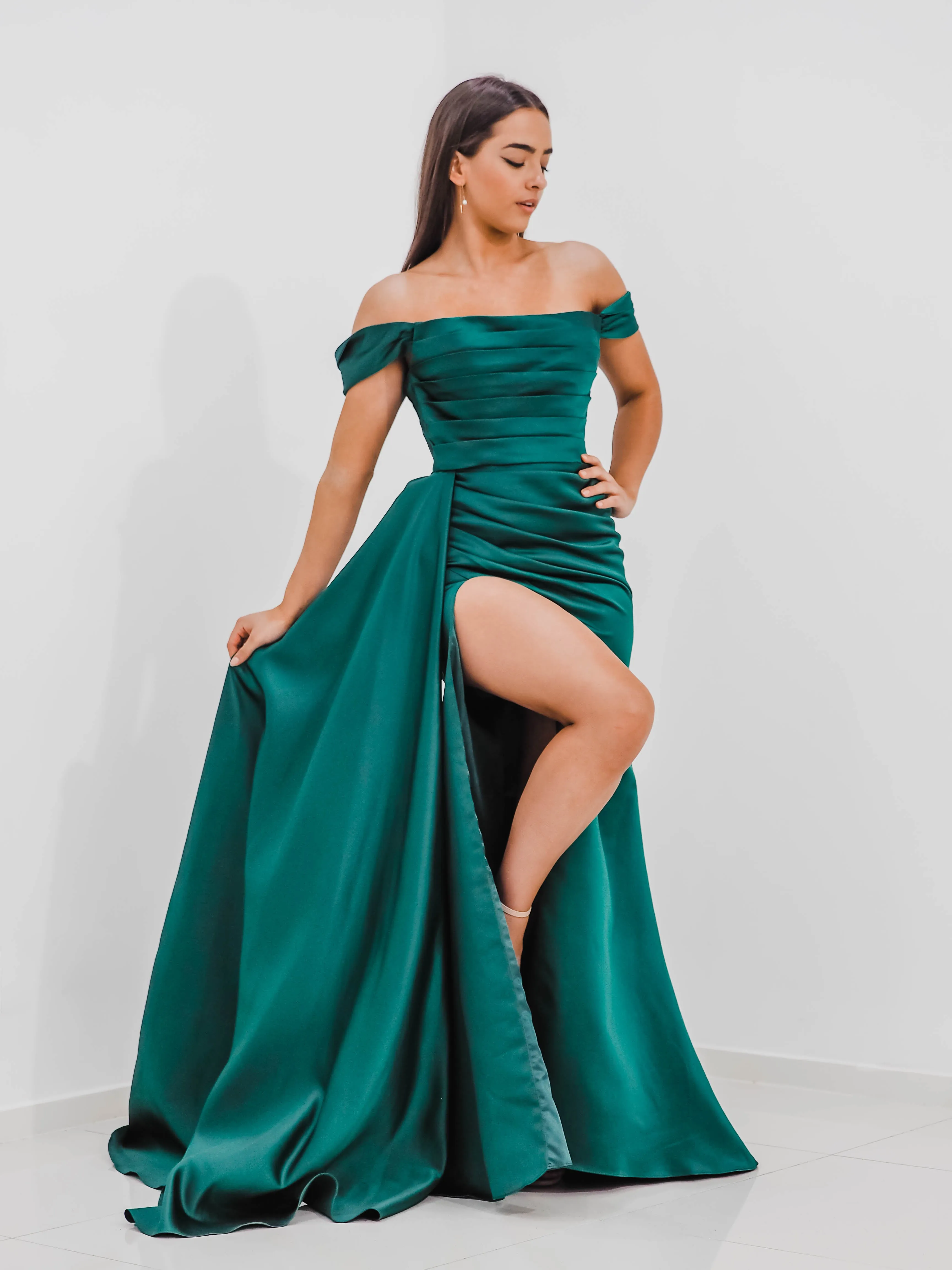 Emerald green Satin column dress with off the shoulder sleeves and high slit