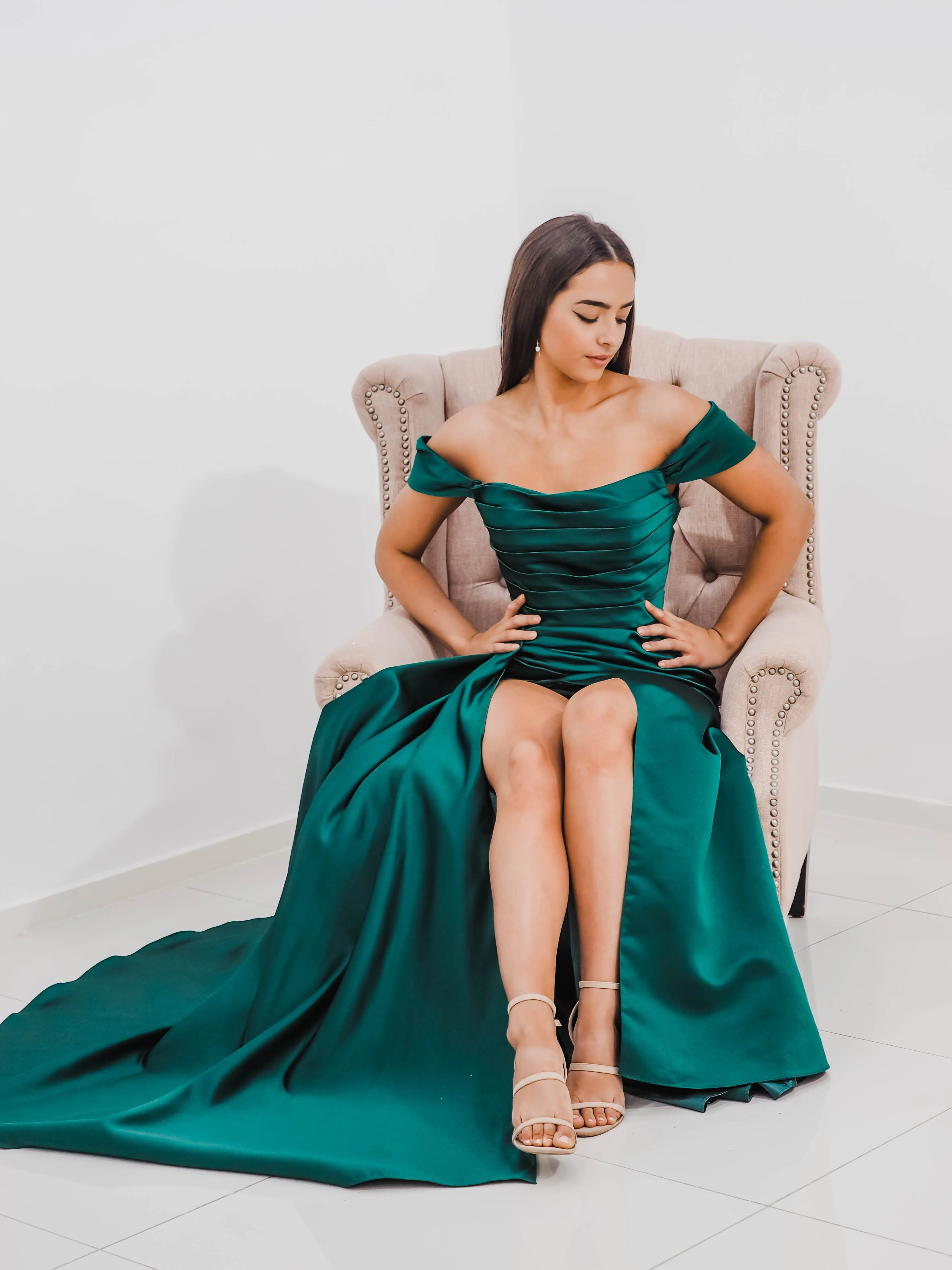 Emerald green Satin column dress with off the shoulder sleeves and high slit